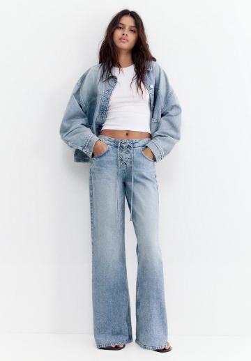 Клешеные джинсы