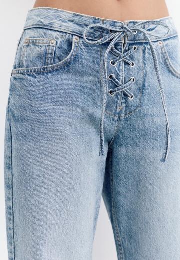 Клешеные джинсы