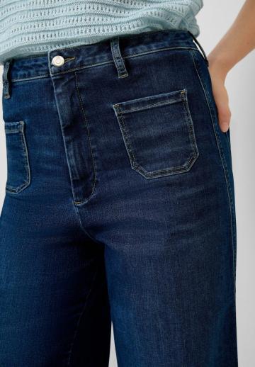 Клешеные джинсы
