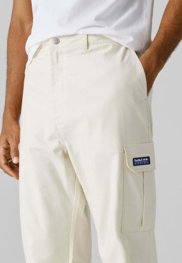 Брюки с накладными карманами