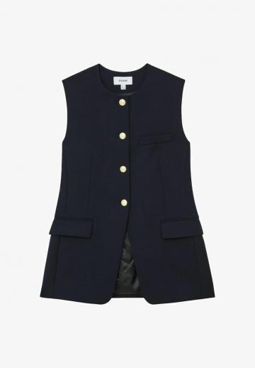 Длинный жилет