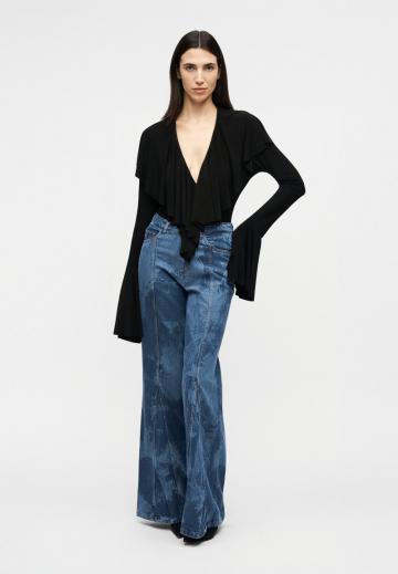 Клешеные джинсы