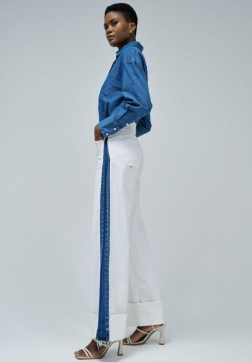 Клешеные джинсы