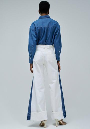 Клешеные джинсы