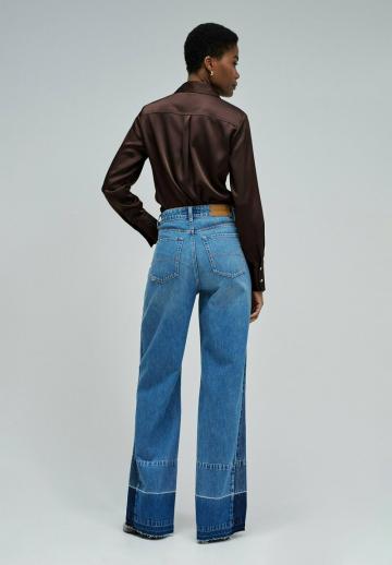 Клешеные джинсы