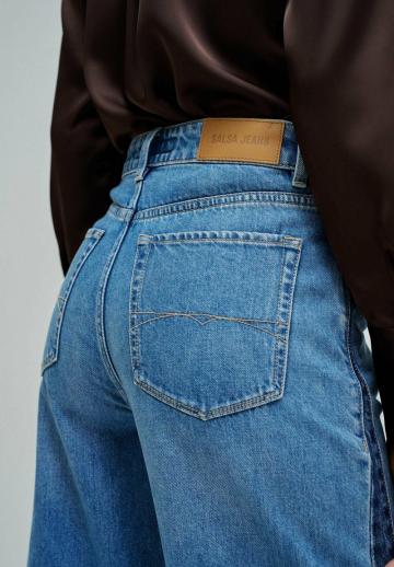 Клешеные джинсы