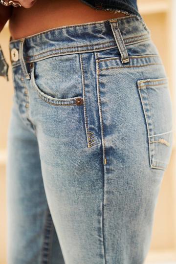 Клешеные джинсы