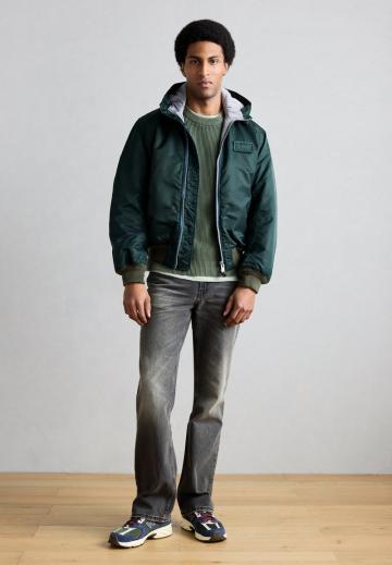 Клешеные джинсы