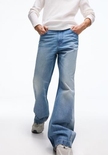 Клешеные джинсы