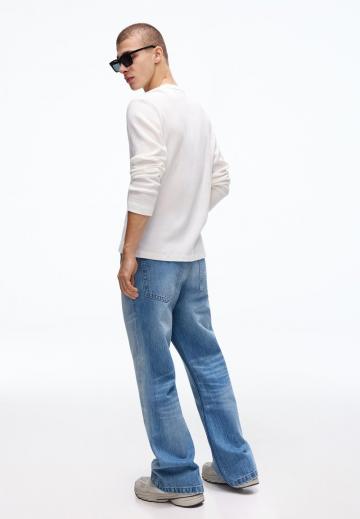 Клешеные джинсы