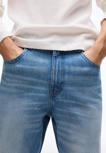 Клешеные джинсы