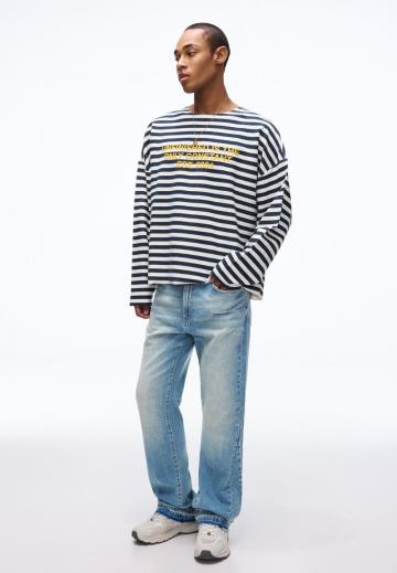 Клешеные джинсы