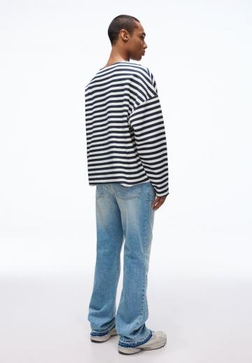 Клешеные джинсы