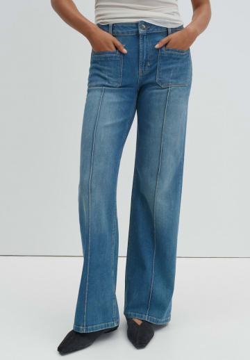Клешеные джинсы