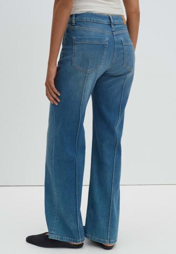 Клешеные джинсы