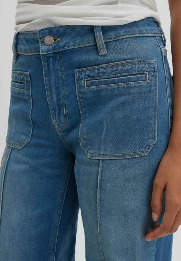 Клешеные джинсы