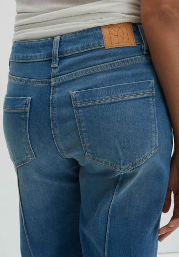 Клешеные джинсы