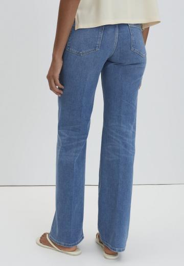 Клешеные джинсы