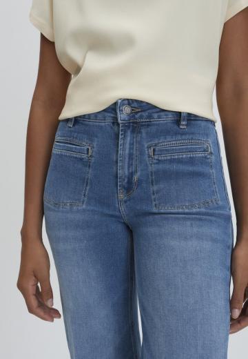 Клешеные джинсы