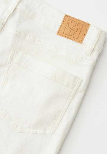 Клешеные джинсы