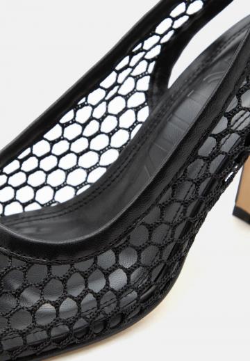 Туфли на высоком каблуке