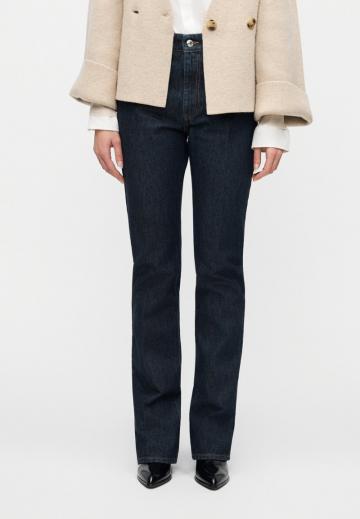 Клешеные джинсы