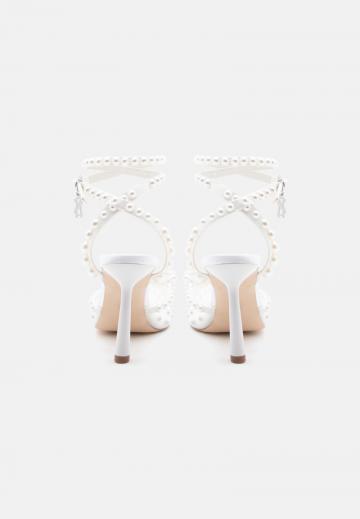 Туфли на высоком каблуке