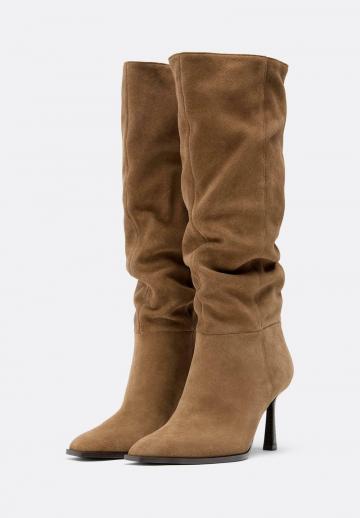 Высокие сапоги