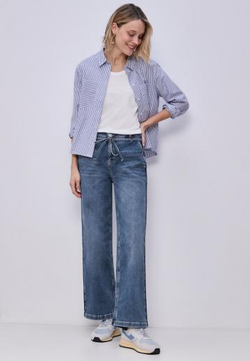 Клешеные джинсы