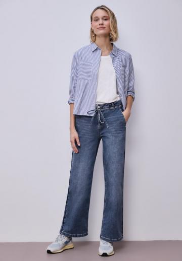 Клешеные джинсы