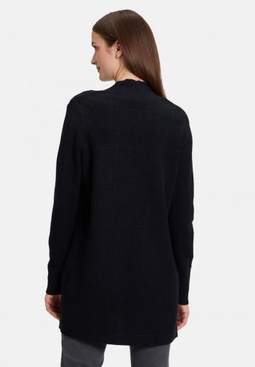 Длинный жилет