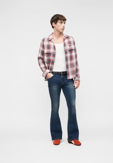 Клешеные джинсы