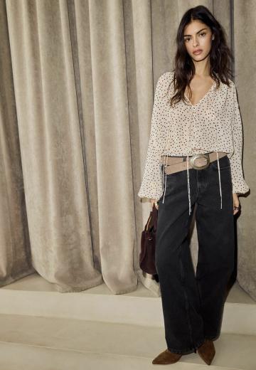 Клешеные джинсы