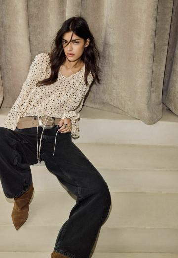 Клешеные джинсы