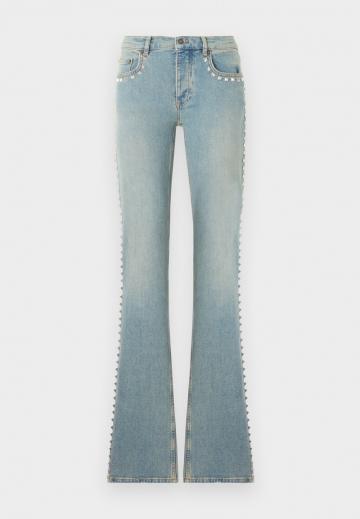 Клешеные джинсы