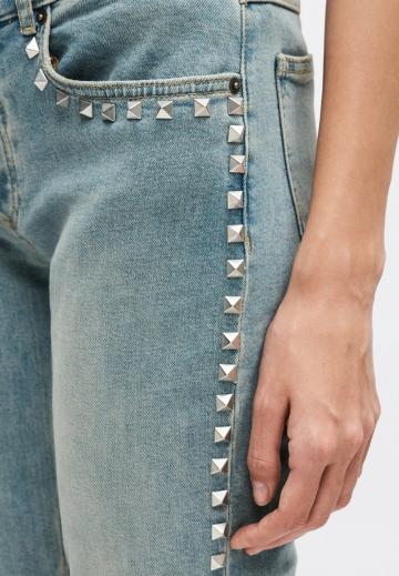 Клешеные джинсы