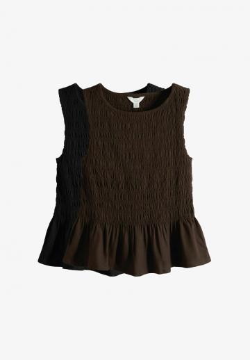 Блузка без рукавов