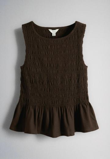 Блузка без рукавов