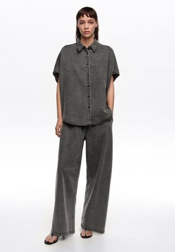 Клешеные джинсы