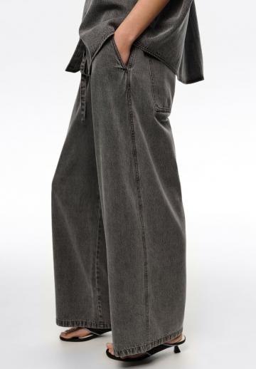 Клешеные джинсы