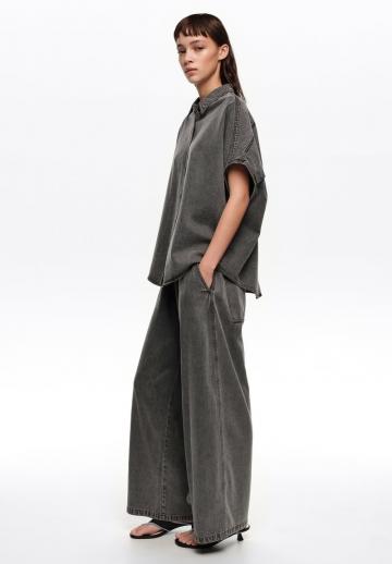 Клешеные джинсы