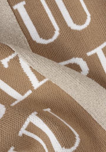 Длинный жилет