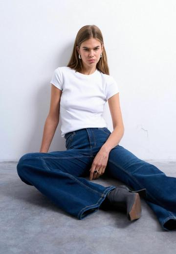 Клешеные джинсы