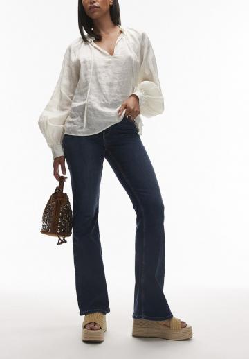 Клешеные джинсы