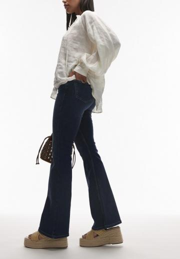 Клешеные джинсы