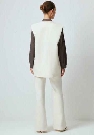 Длинный жилет