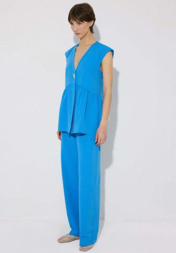 Длинный жилет