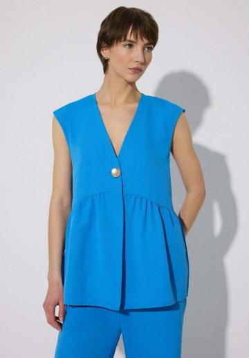 Длинный жилет