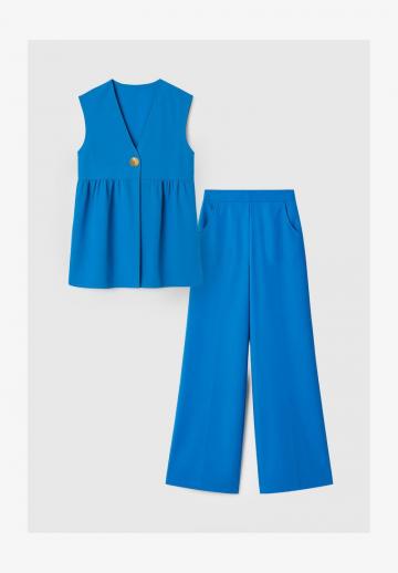 Длинный жилет