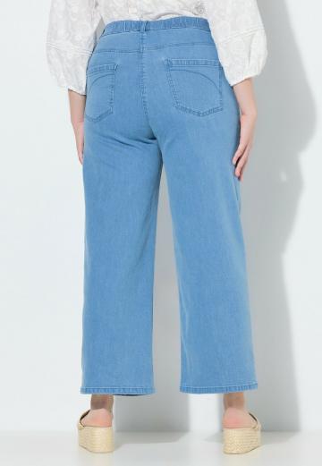 Клешеные джинсы